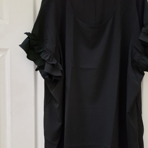 Lane Bryant Tops - NWOT Ruffled sleeve blouse 🎉🎉HP💕💕